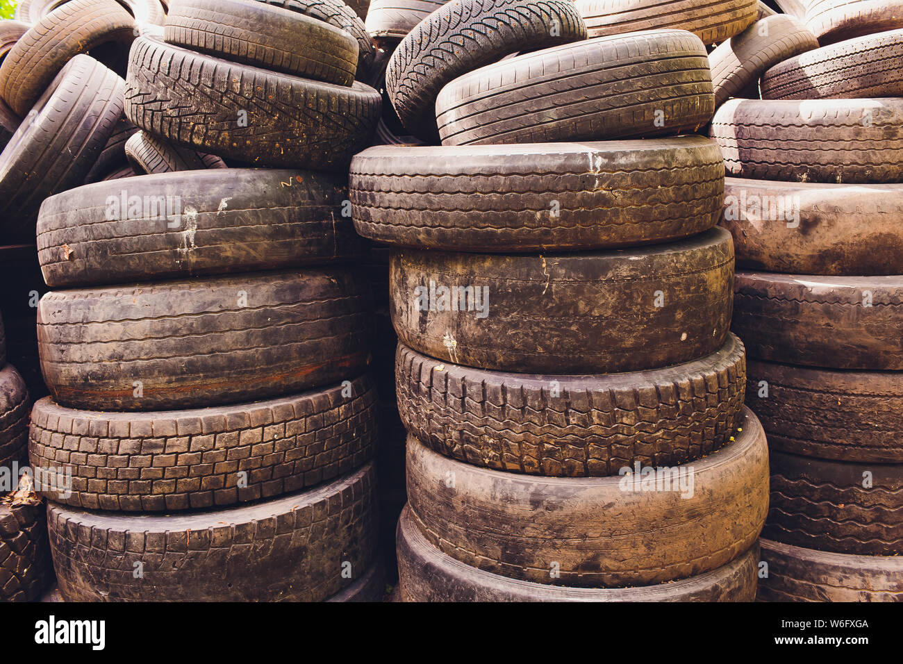 Dump old car tires. A whole bunch of car wheels Stock Photo Alamy