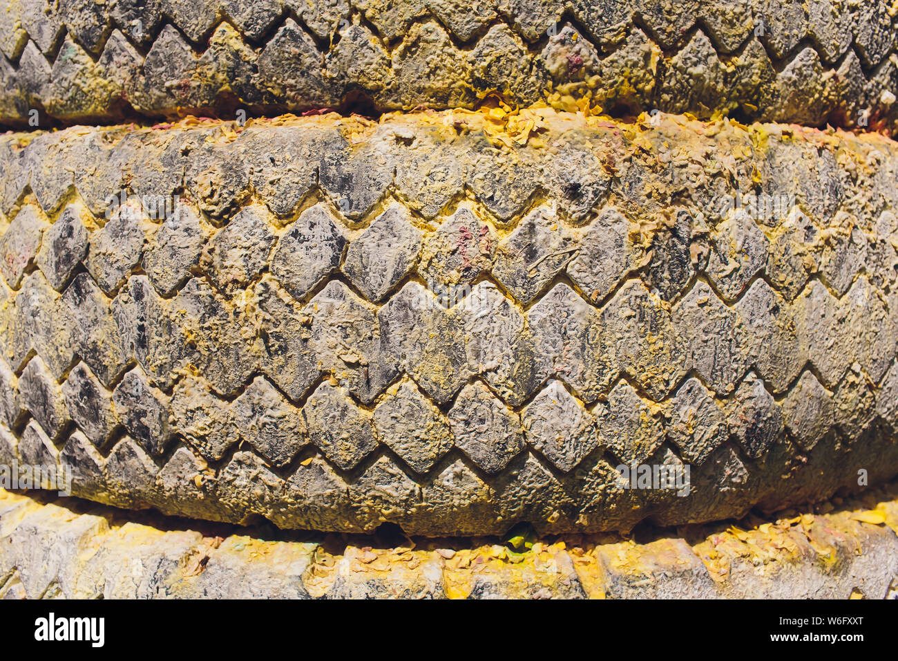 Wheel worn wear rubber tyre junkyard recycling heap hires stock