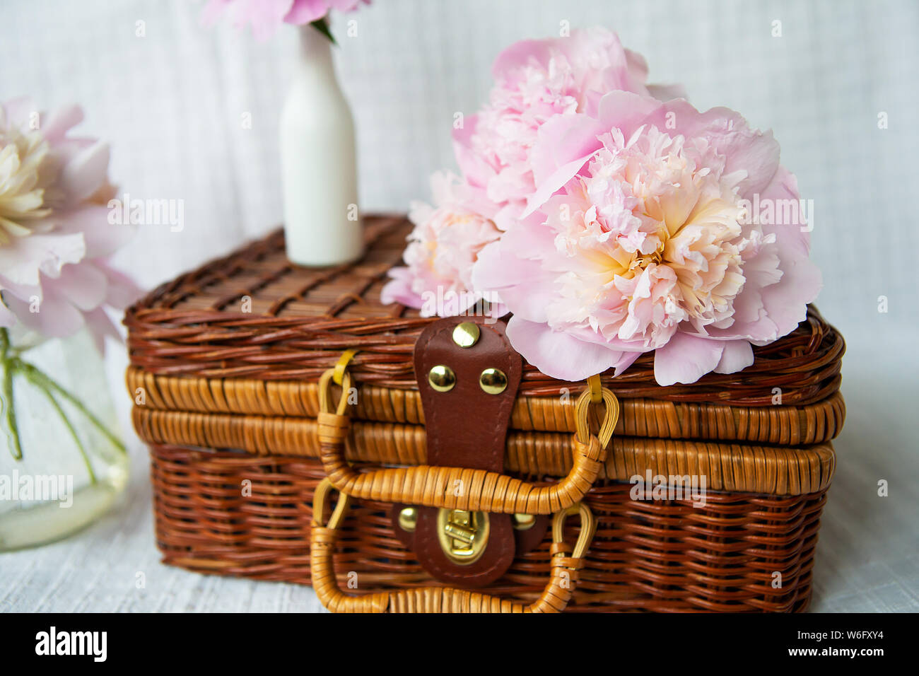 A Very Beautiful Bouquet Of Pink Peonies In A Vase Stands On A