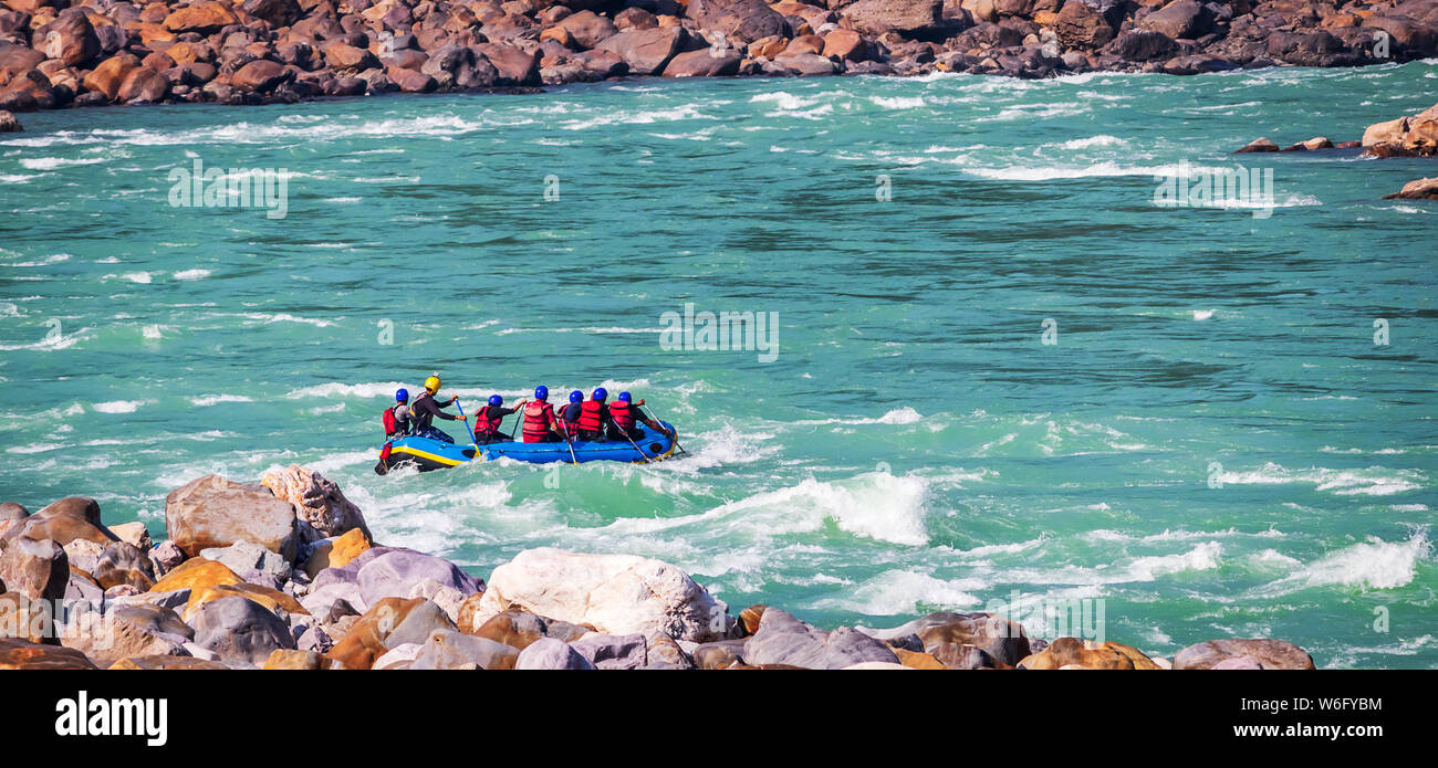 Rafting on  river Ganges in Rishikesh Uttarakhand, India.Famous tourist attraction Stock Photo