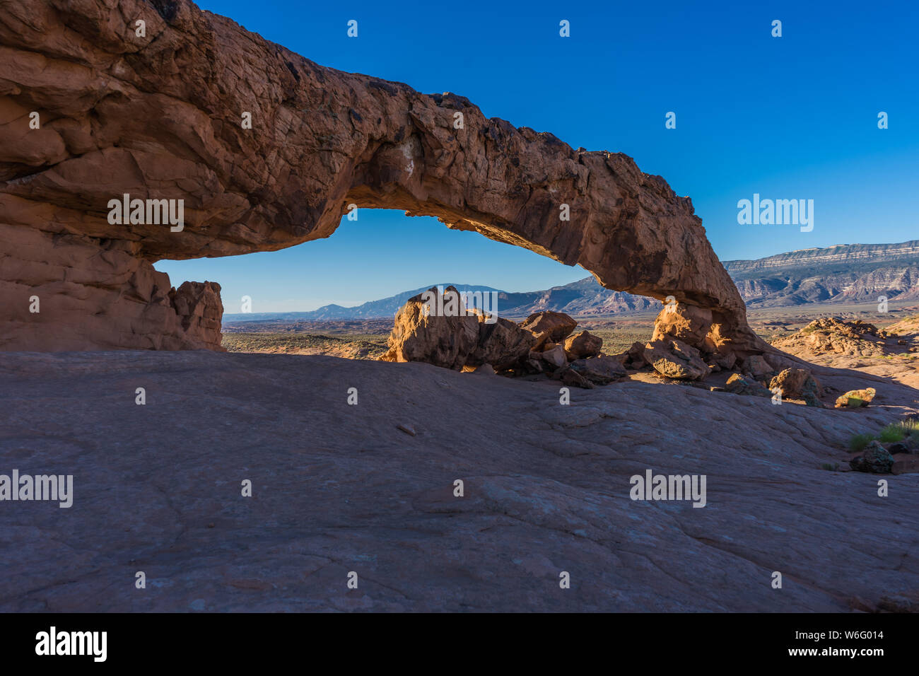 Sunset Arch in Grand Staircase Escalante National Monument Stock Photo