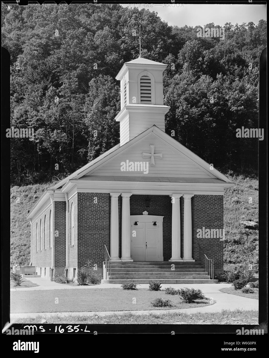 Church in company housing project for miners. Basement also serves as gathering and meeting place for Lion's Club, Women's organizations, etc. Koppers Coal Divison, Kopperston Mine, Kopperston, Wyoming County, West Virginia. Stock Photo