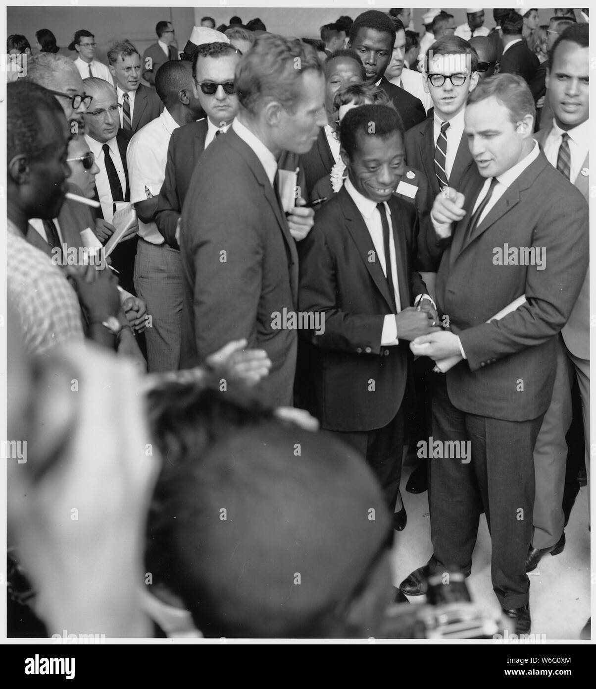civil-rights-march-on-washington-dc-author-james-baldwin-with-actors-marlon-brando-and-charlton-heston-W6G0XM.jpg
