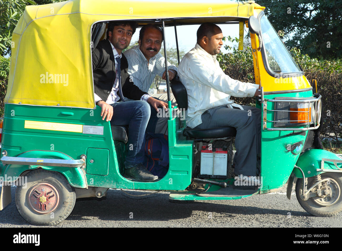 Passenger travelling in auto rickshaw Stock Photo