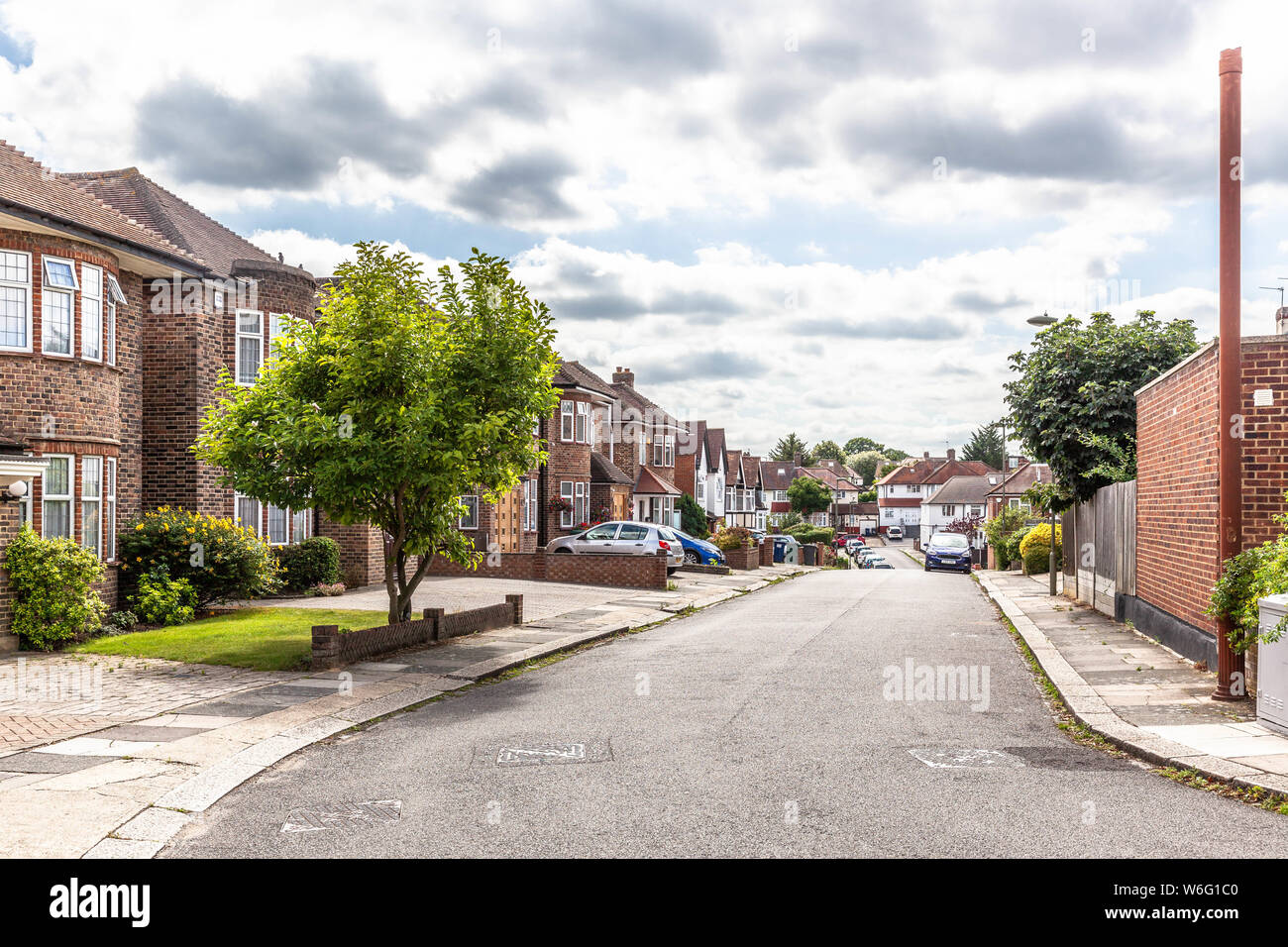 Street scene in a residential area, Ashcombe Gardens, Edgware, England, UK. Stock Photo