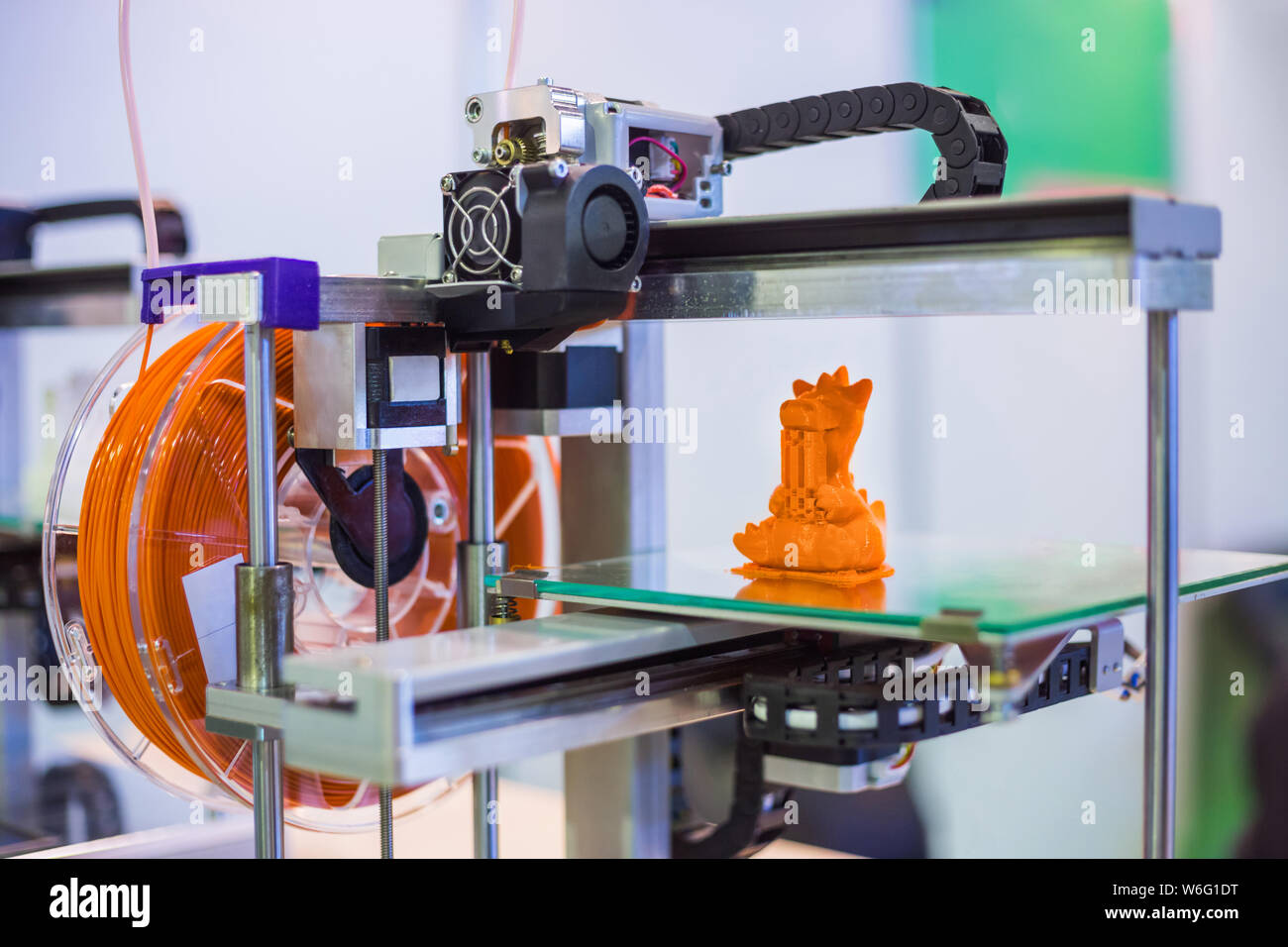 Automatic three 3D printer machine printing plastic model Photo -