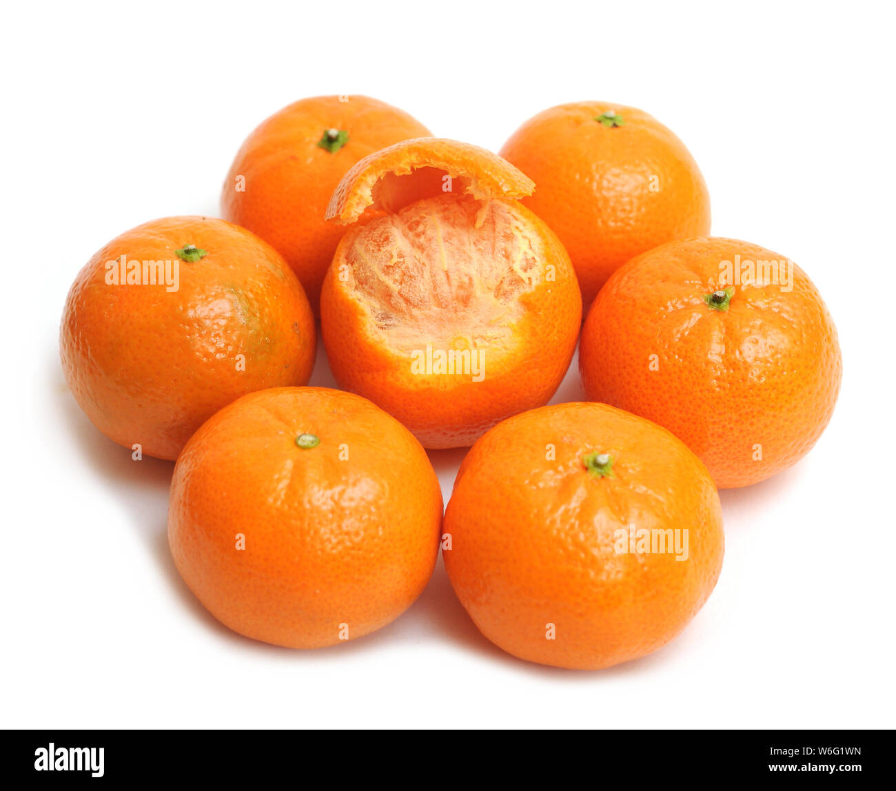 a group of clementines on white background Stock Photo Alamy