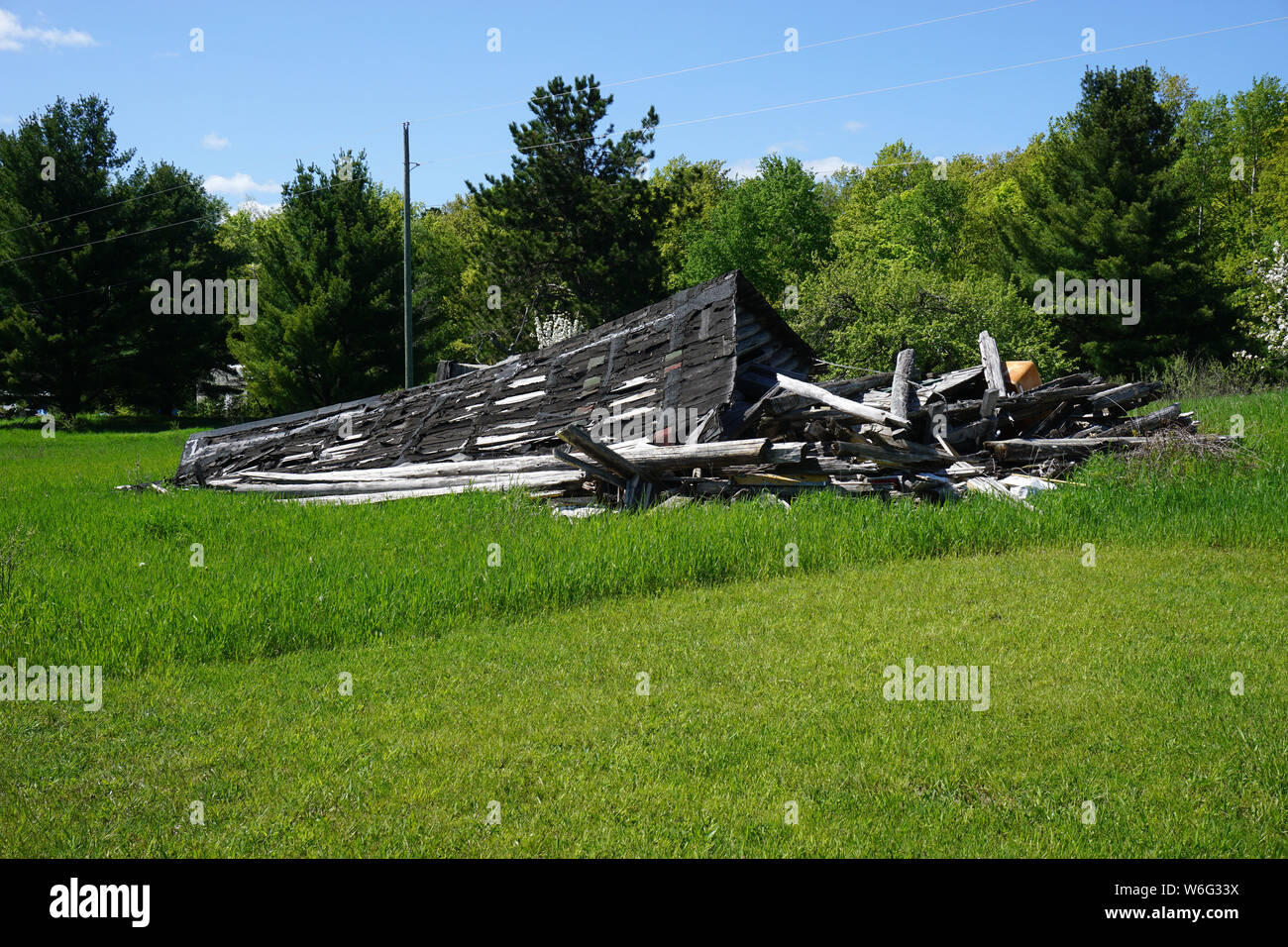 Collapsed Log Cabin Stock Photo