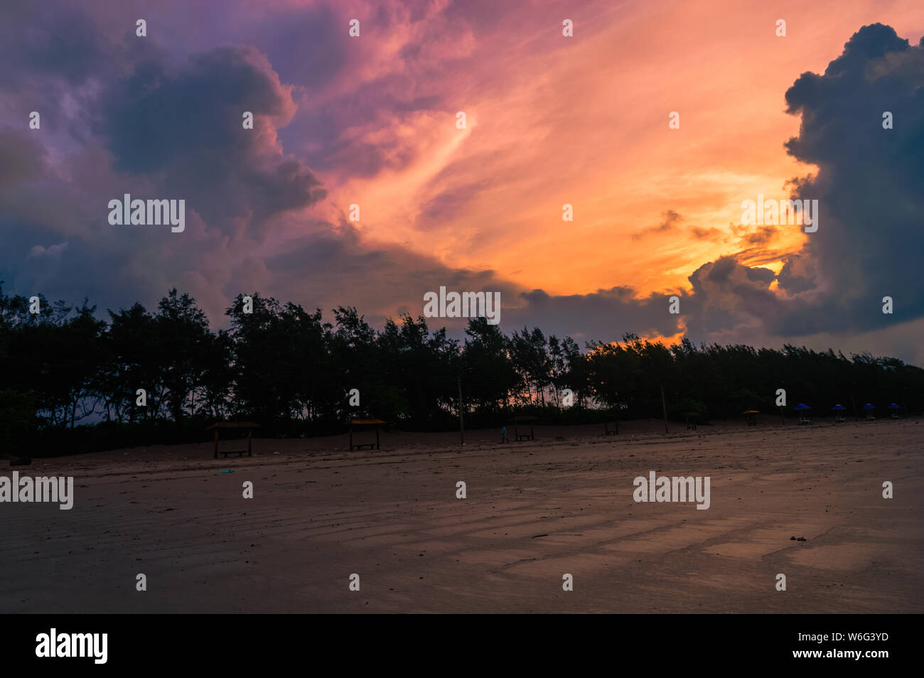 sunset on a beach Stock Photo - Alamy