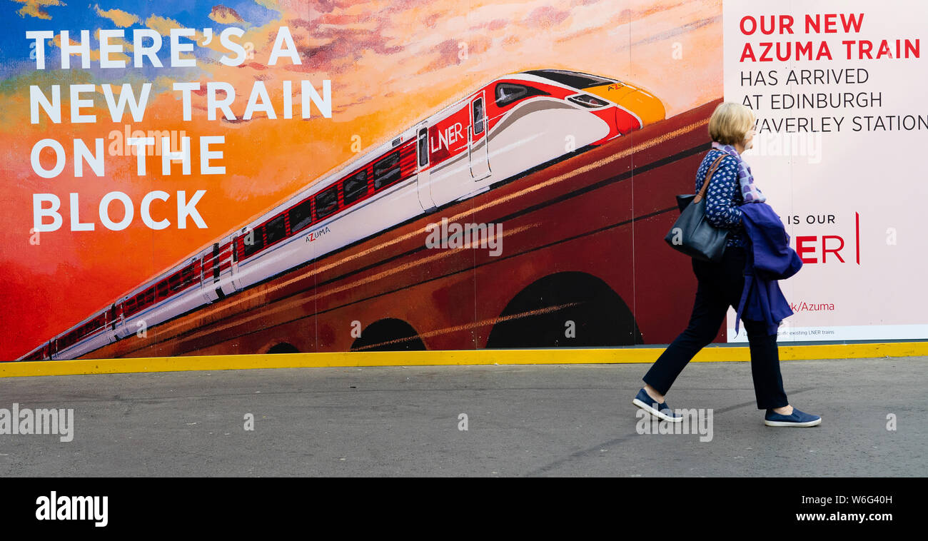 Edinburgh, Scotland, UK. 1 August 2019. LNER company billboard at Waverley Station in Edinburgh advertising new Azuma train on the Edinburgh to London King's Cross route which starts today. Credit: Iain Masterton/Alamy Live News Stock Photo