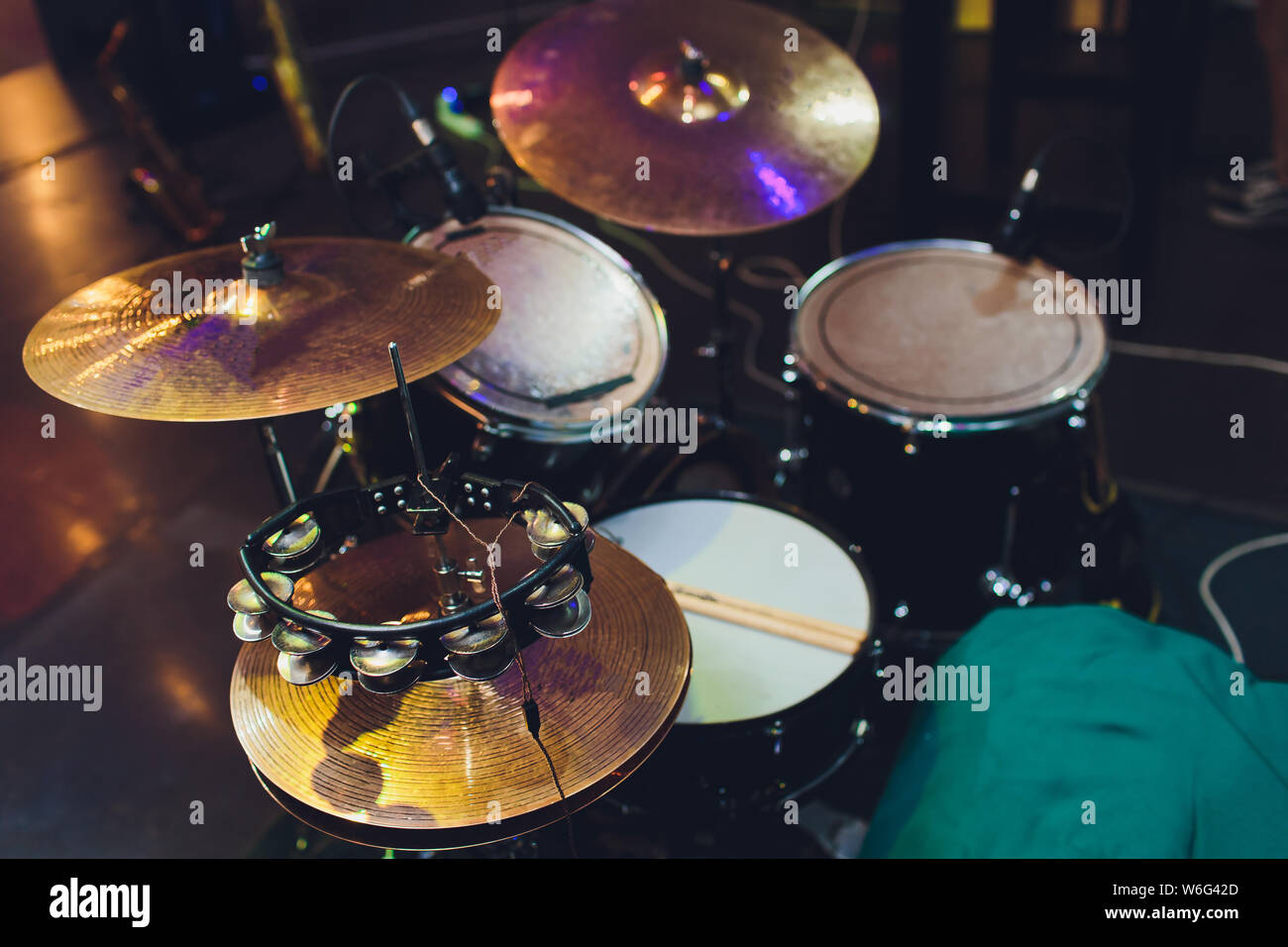 Modern drum set on stage prepared for playing Stock Photo Alamy