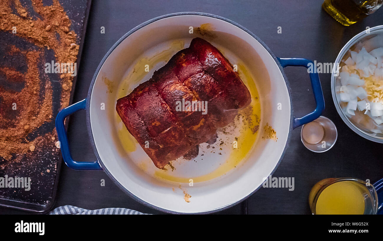Flat lay. Step by step. Cooking boneless pork roast in cast iron dutch