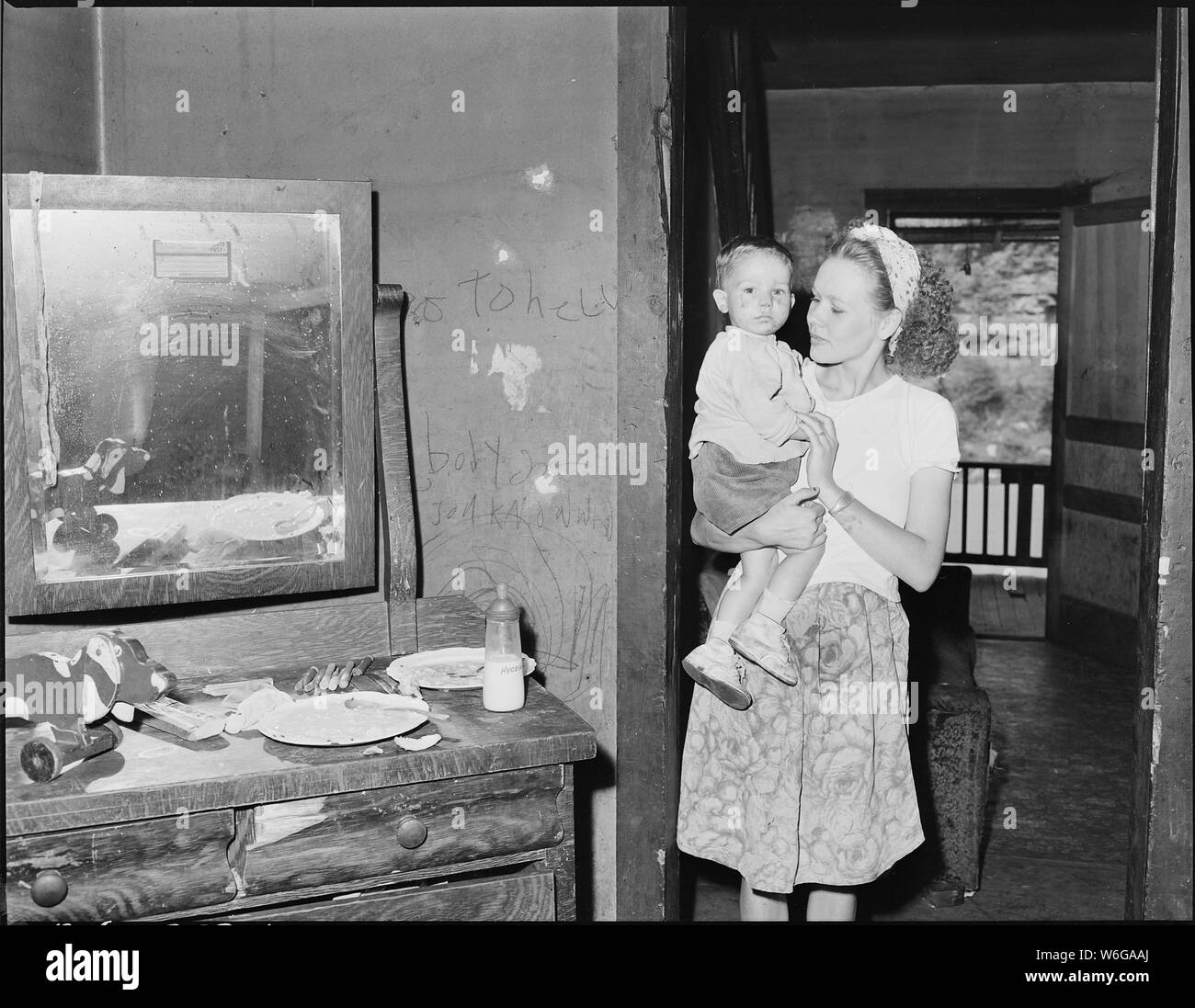 Daughterinlaw of a miner, wife of a miner and her son. Southern Coal