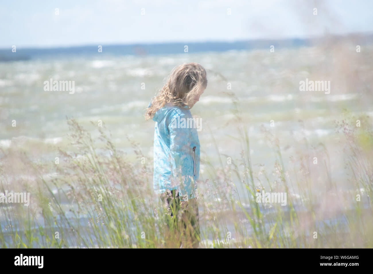 Girl by the sea Stock Photo