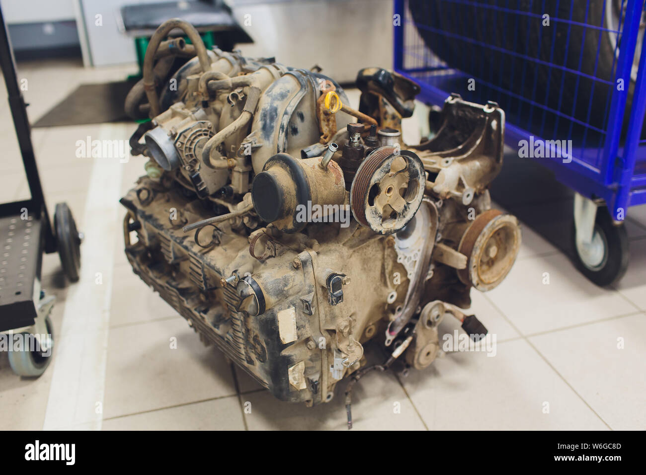 an old outdated engine, a closeup shot, engine car broken Stock Photo