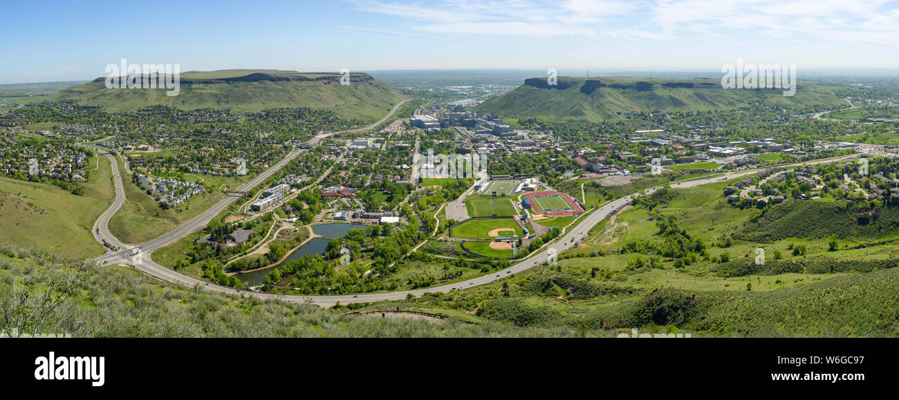 City of Golden - A panoramic Spring morning view of city of Golden, situated between North and South Table Mountains, Colorado, USA. Stock Photo