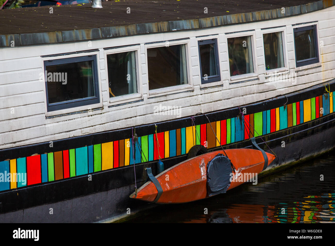 boat on a house boat at the river Amstel in Amsterdam Stock Photo