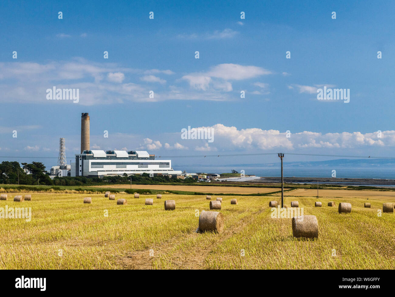 Aberthaw Power Station in the Vale of Glamorgan South Wales behind farmland Stock Photo
