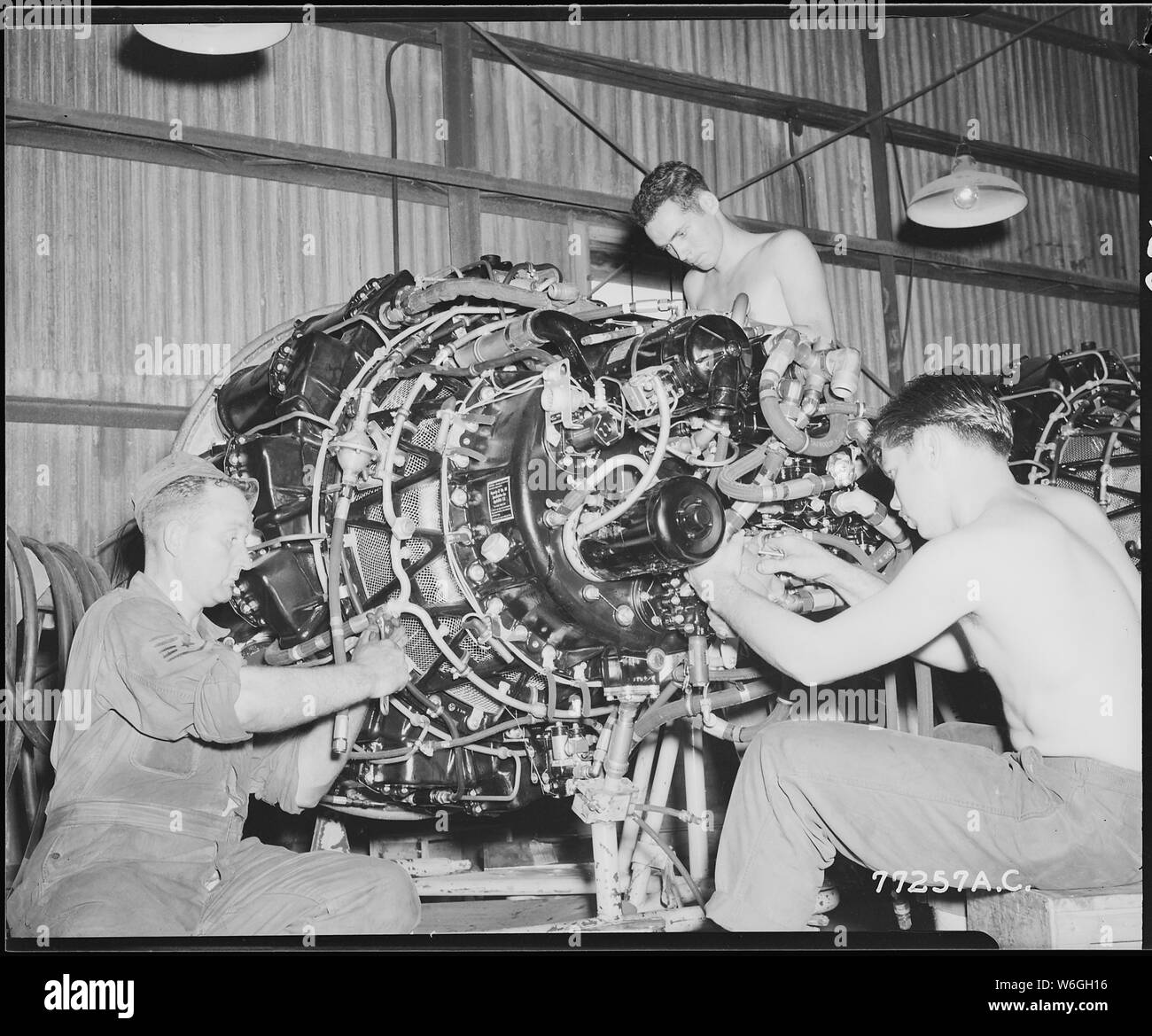 F-80 JET ENGINE CHECKED FOR INSTALLATION. S/Sgt. Roy James, 32, of