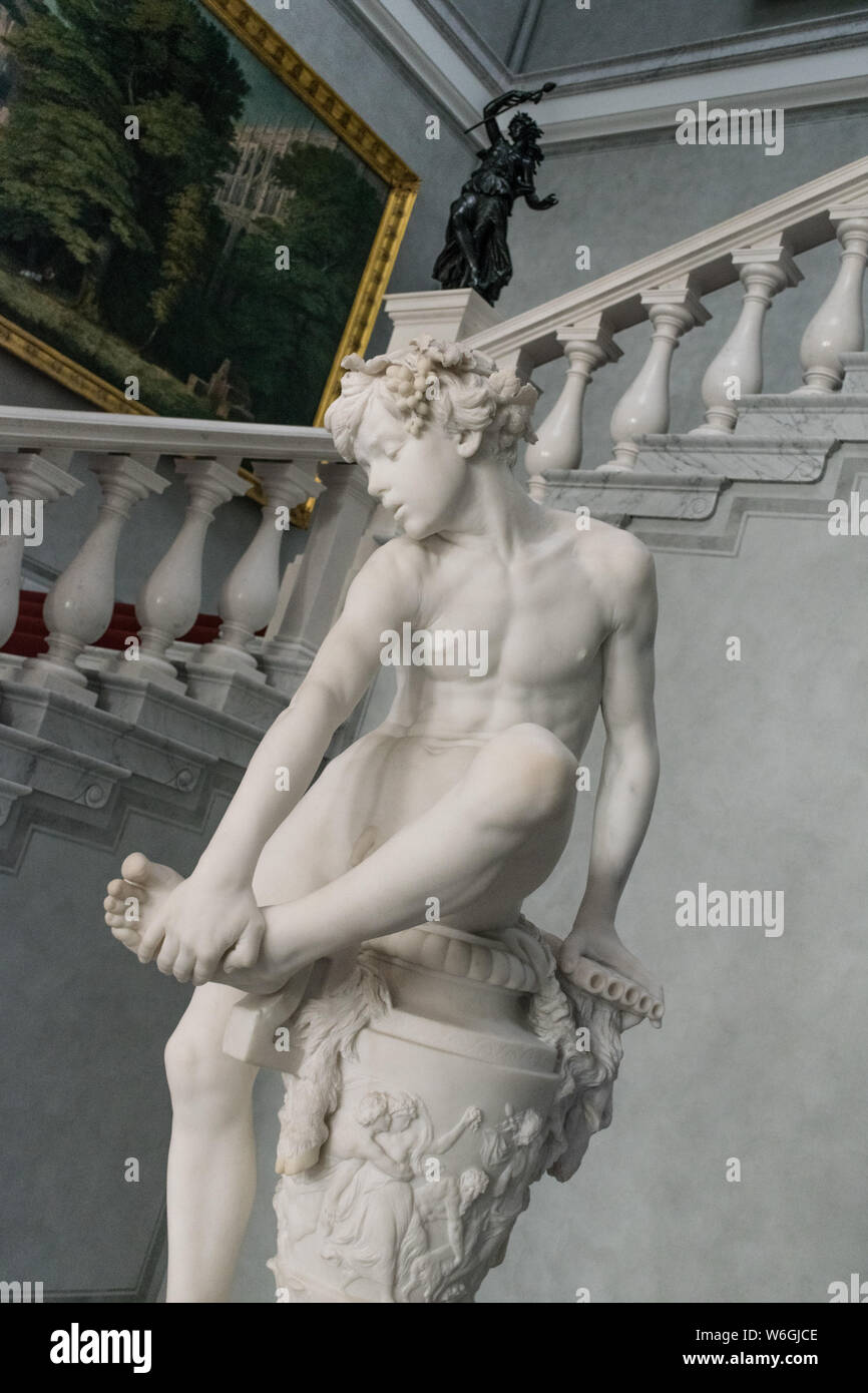 BERLIN, GERMANY - SEPTEMBER 26, 2018: 'Boy removing Thorn' statue, made by the German sculptor, painter and writer Gustav Eberlein and located inside Stock Photo