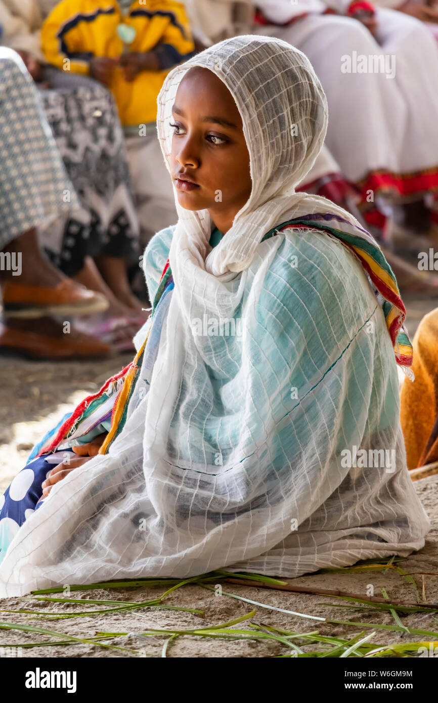 A young Ethiopian girl at the Church of Saint George during Timkat, the Orthodox Tewahedo celebration of Epiphany, celebrated on January 19th Stock Photo