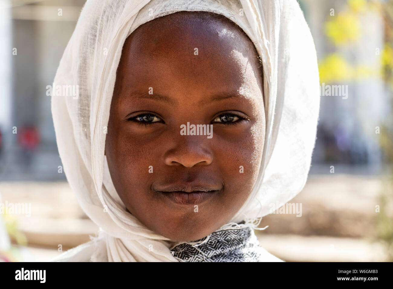 Portrait of a young Ethiopian girl at the Church of Saint George during Timkat, the Orthodox Tewahedo celebration of Epiphany, celebrated on Januar... Stock Photo