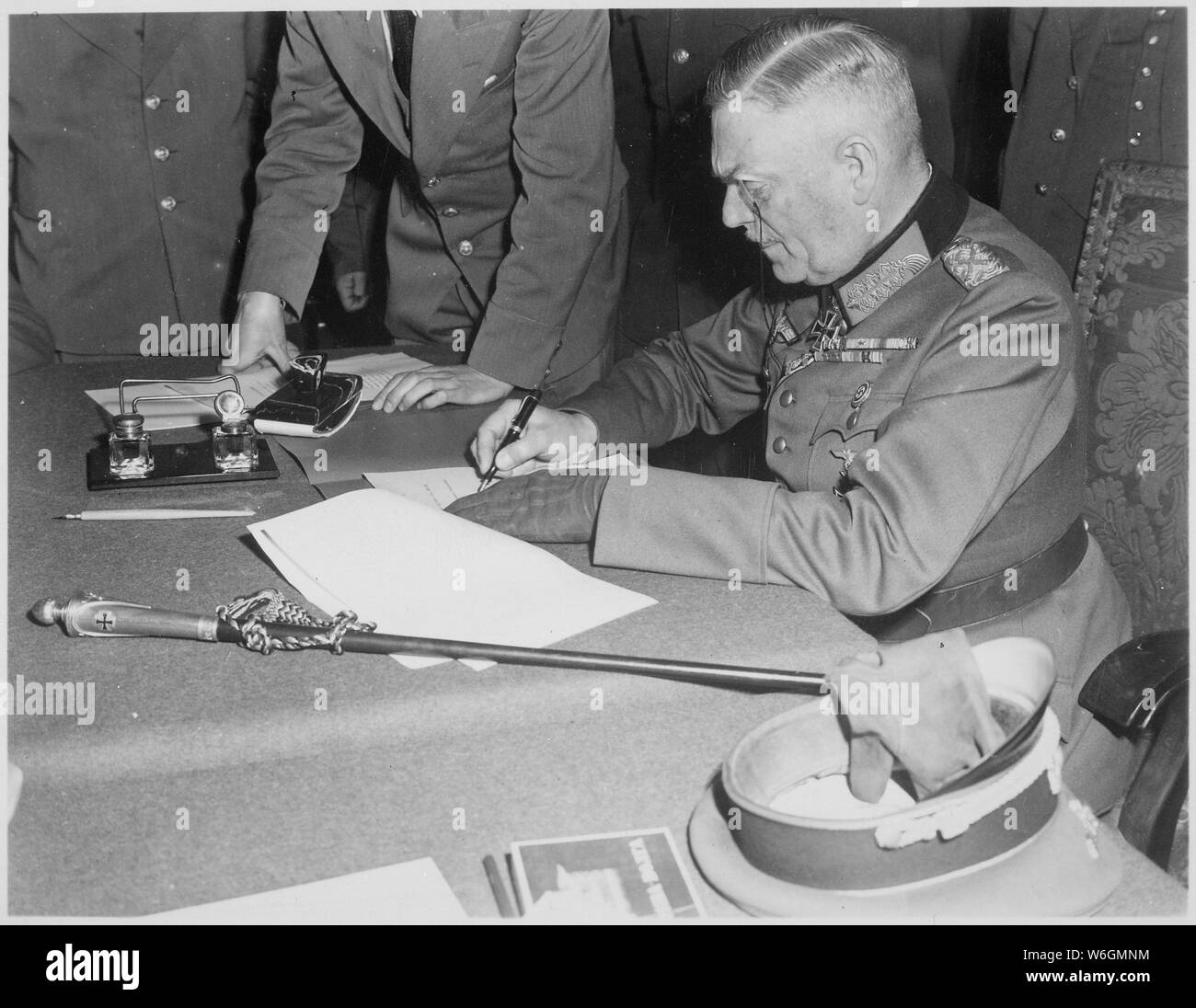 Field Marshall Wilhelm Keitel, signing the ratified surrender terms for the German Army at Russian Headquarters in Berlin. Germany, May 7, 1945.; General notes:  Use War and Conflict Number 1353 when ordering a reproduction or requesting information about this image. Stock Photo