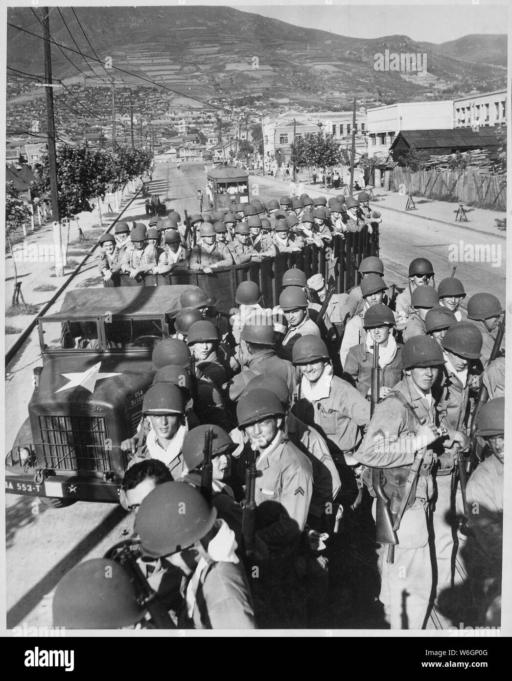 Fresh and eager U.S. Marine troops, newly-arrived at the vital southern supply port of Pusan, are shown prior to moving up to the front lines. International News Photos.; General notes:  Use War and Conflict Number 1386 when ordering a reproduction or requesting information about this image. Stock Photo