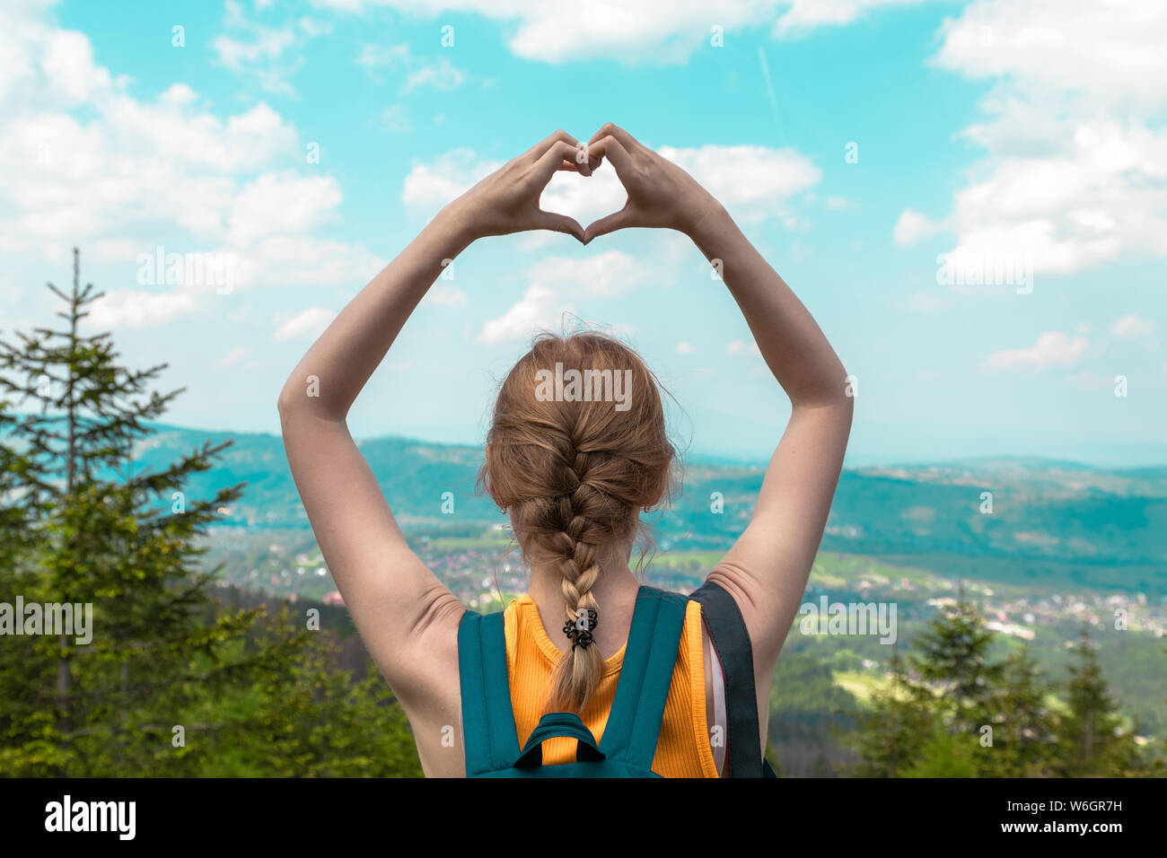 Travel and Vacation concept. Hands heart love symbol shaped women