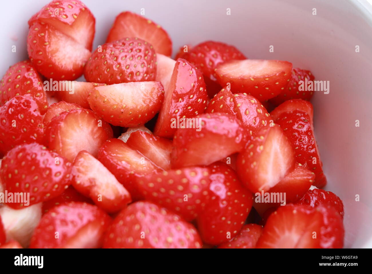 Strawberries in bowl Stock Photo