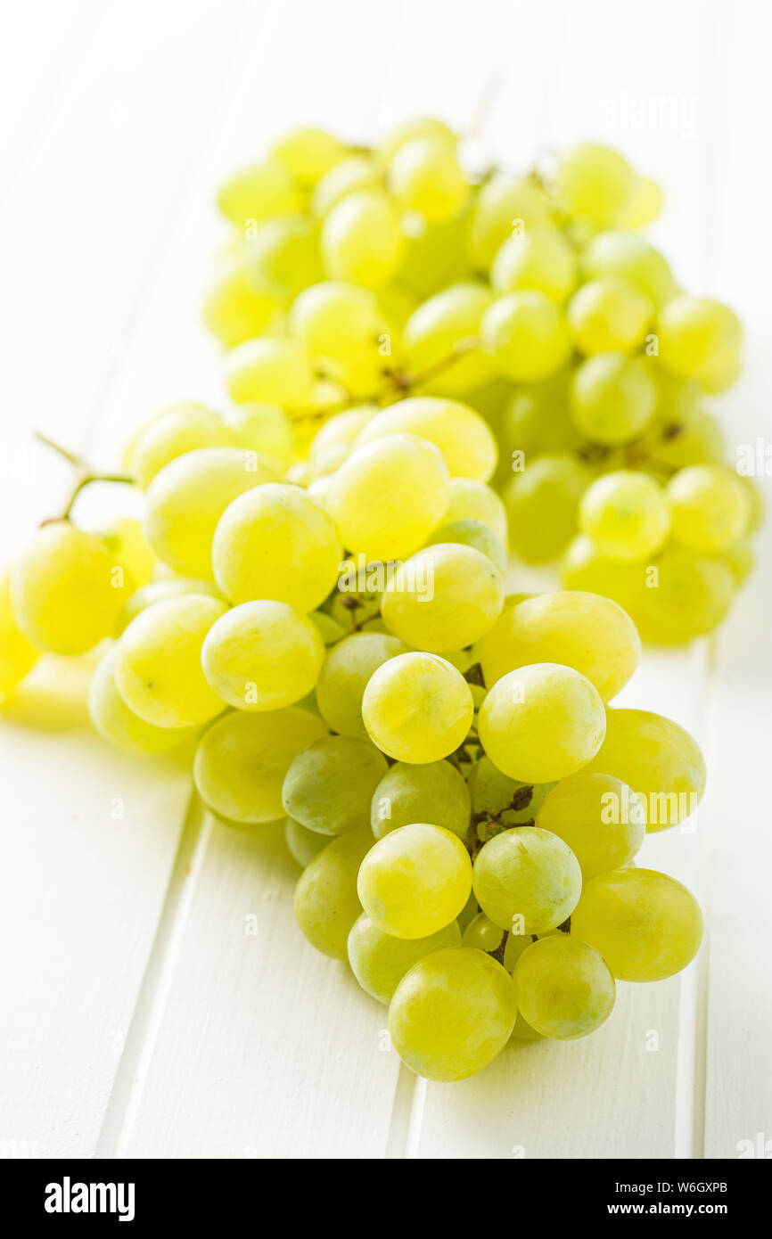 Tasty green grapes. White grape on white table Stock Photo Alamy