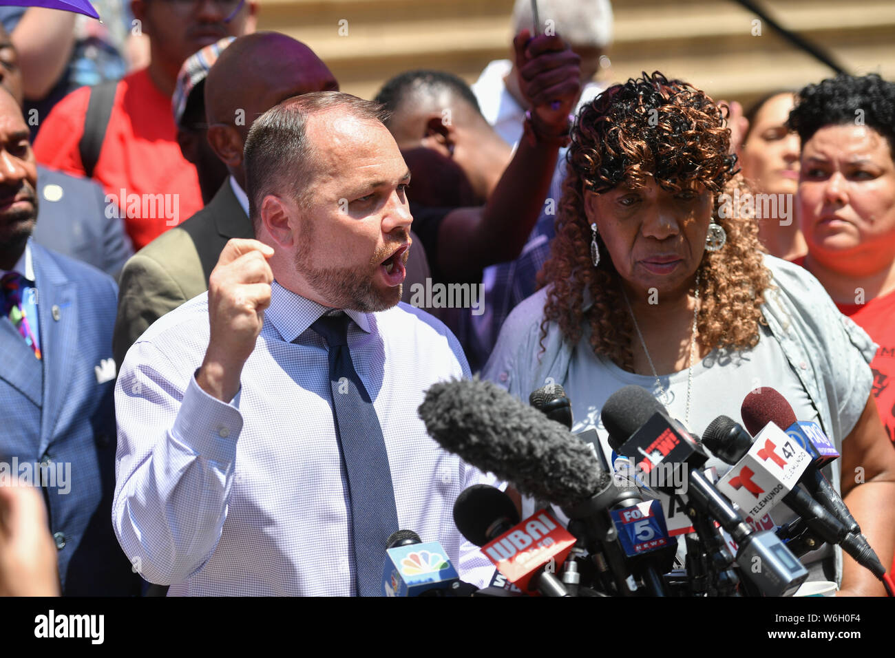 NYC Council Speaker Corey Johnson and Gwen Carr, Eric Garner’s mother, speak during a press conference on July 16, 2019 in NY. Stock Photo