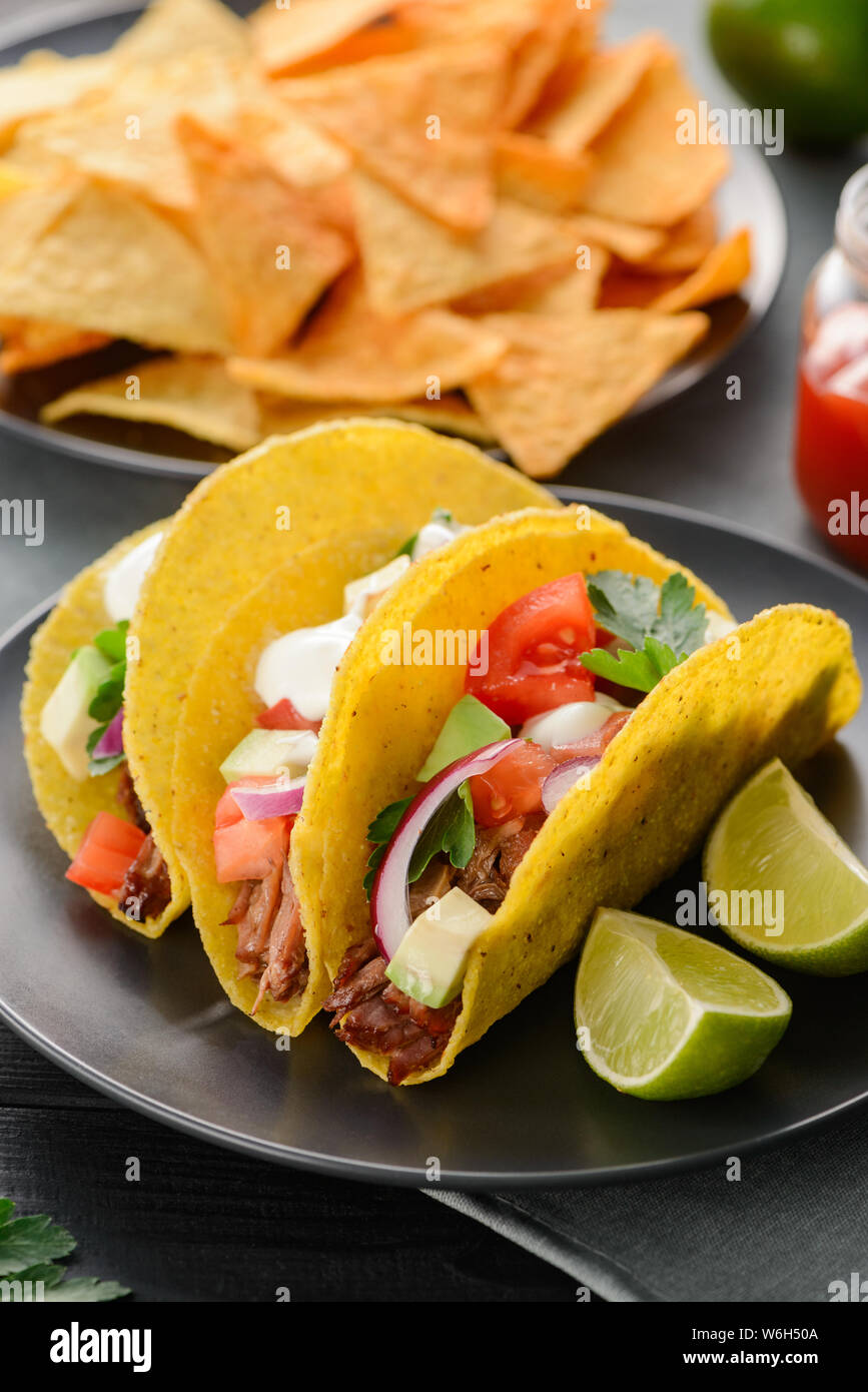 Plates of nachos and tacos Stock Photo Alamy