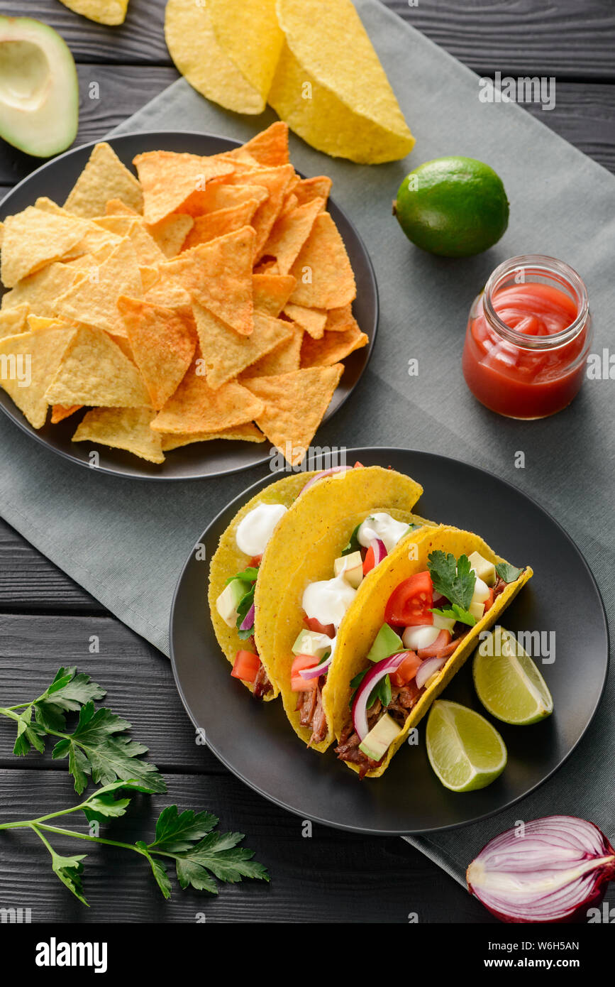 Plates of nachos and tacos Stock Photo Alamy