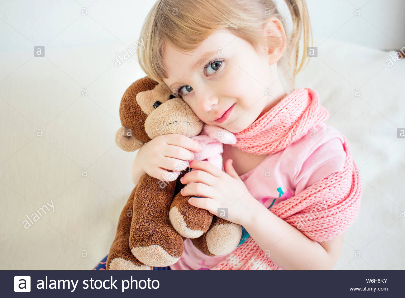 The Child Is Freezing In A Scarf Cute Baby Soft Hug A Toy Baby