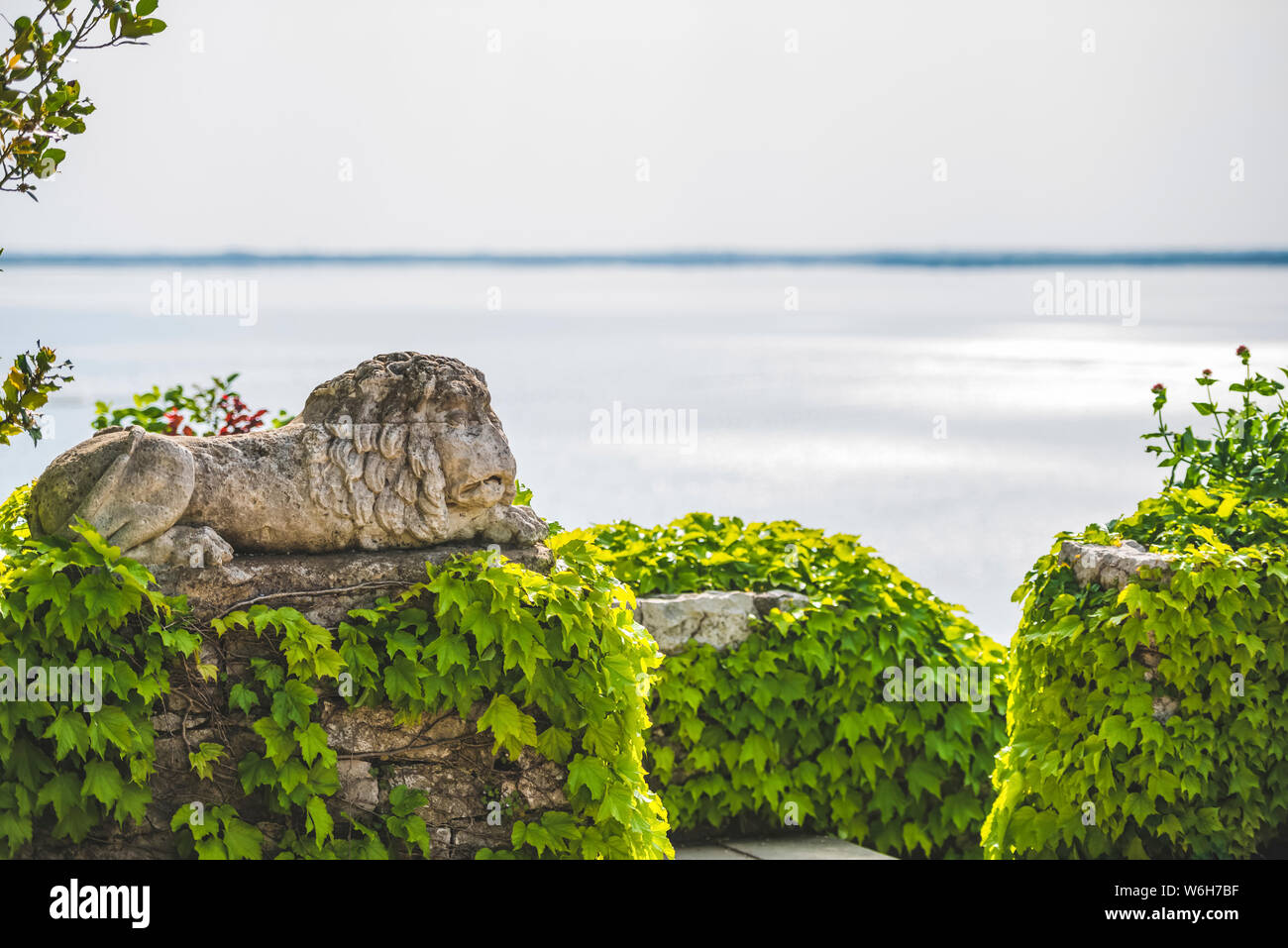 View of the Gulf of Trieste from Duino Castle and stones covered in vines; Italy Stock Photo