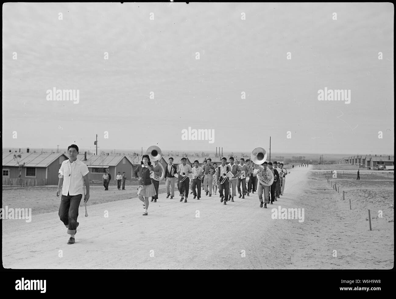 Granada Relocation Center, Amache, Colorado. High school band marching