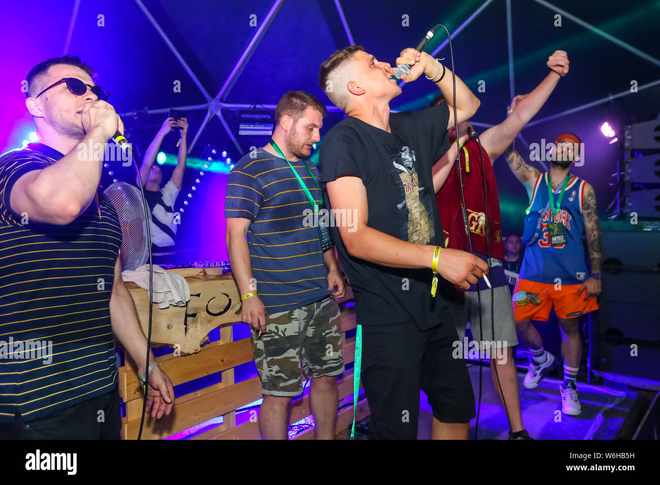 Brezje, Croatia - 20th July, 2019 : Croatian trap group High5 (Hladni, Rade Ulica, Ridi Rid, Snajper and Zugi ) performs on the Forestland, ultimate f Stock Photo