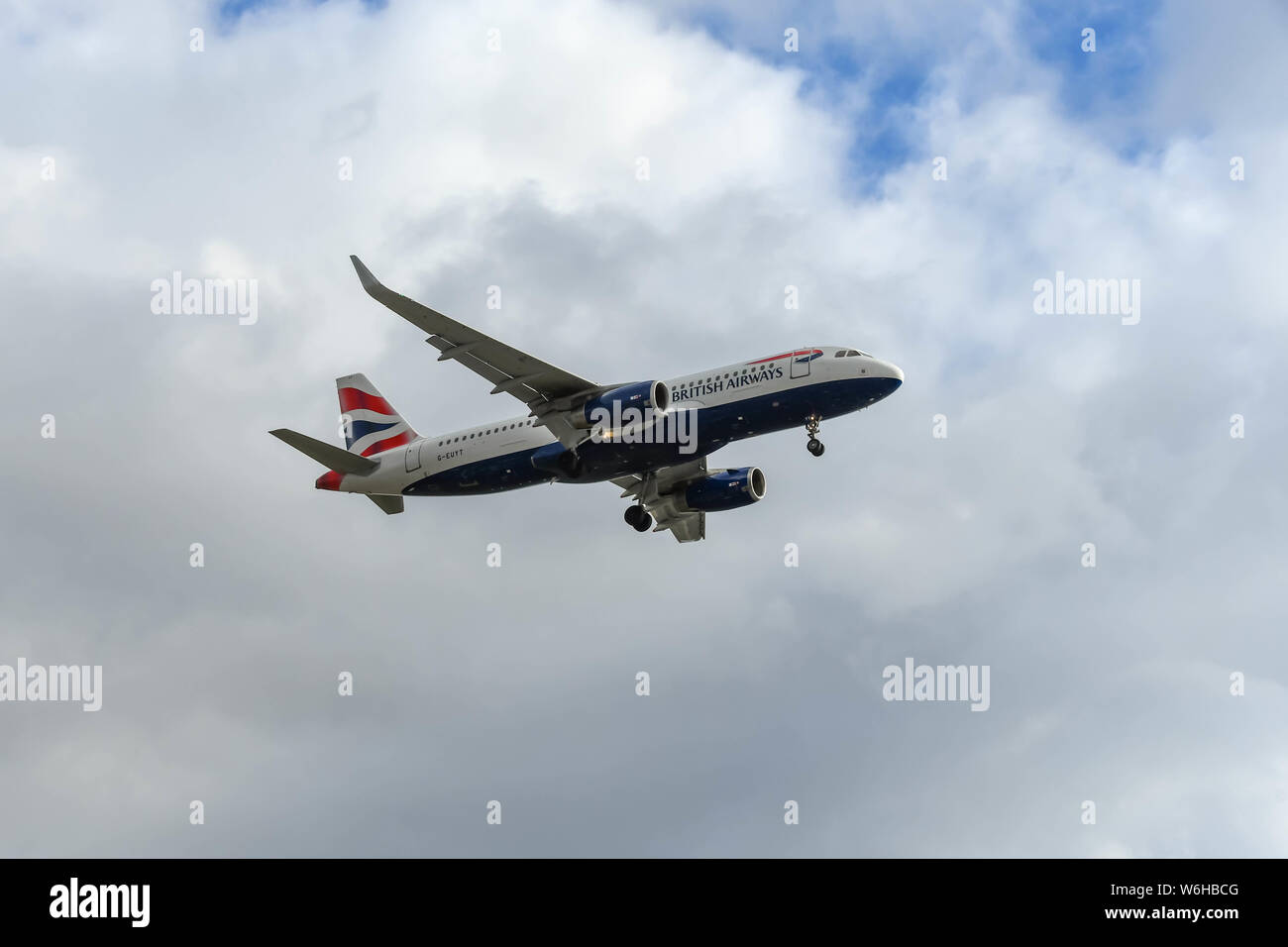 LONDON HEATHROW AIRPORT - MARCH 2019: Airbus A320 jet operated by British Airways coming in to land at London Heathrow Airport. Stock Photo