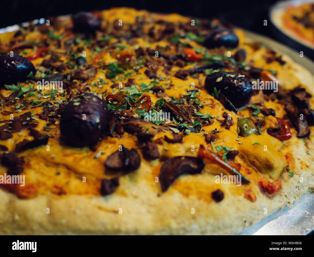 Close-up of plant based pizzas made with vegetarian cheese Stock Photo