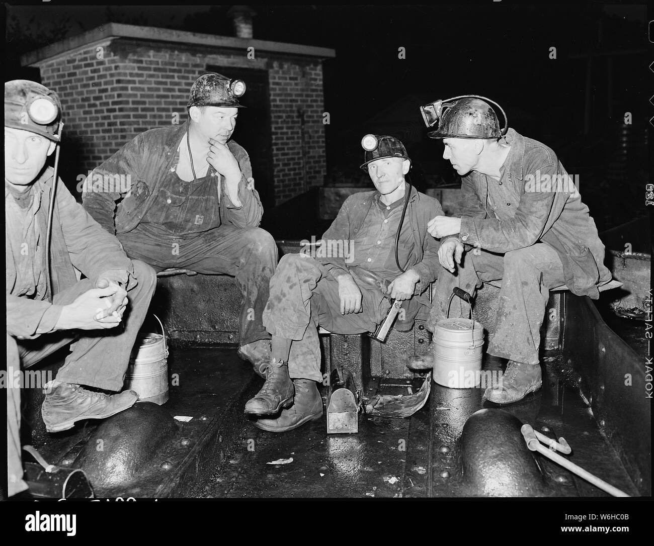 Group of miners waiting to go underground on morning shift. Inland Steel Company, Wheelwright 1
