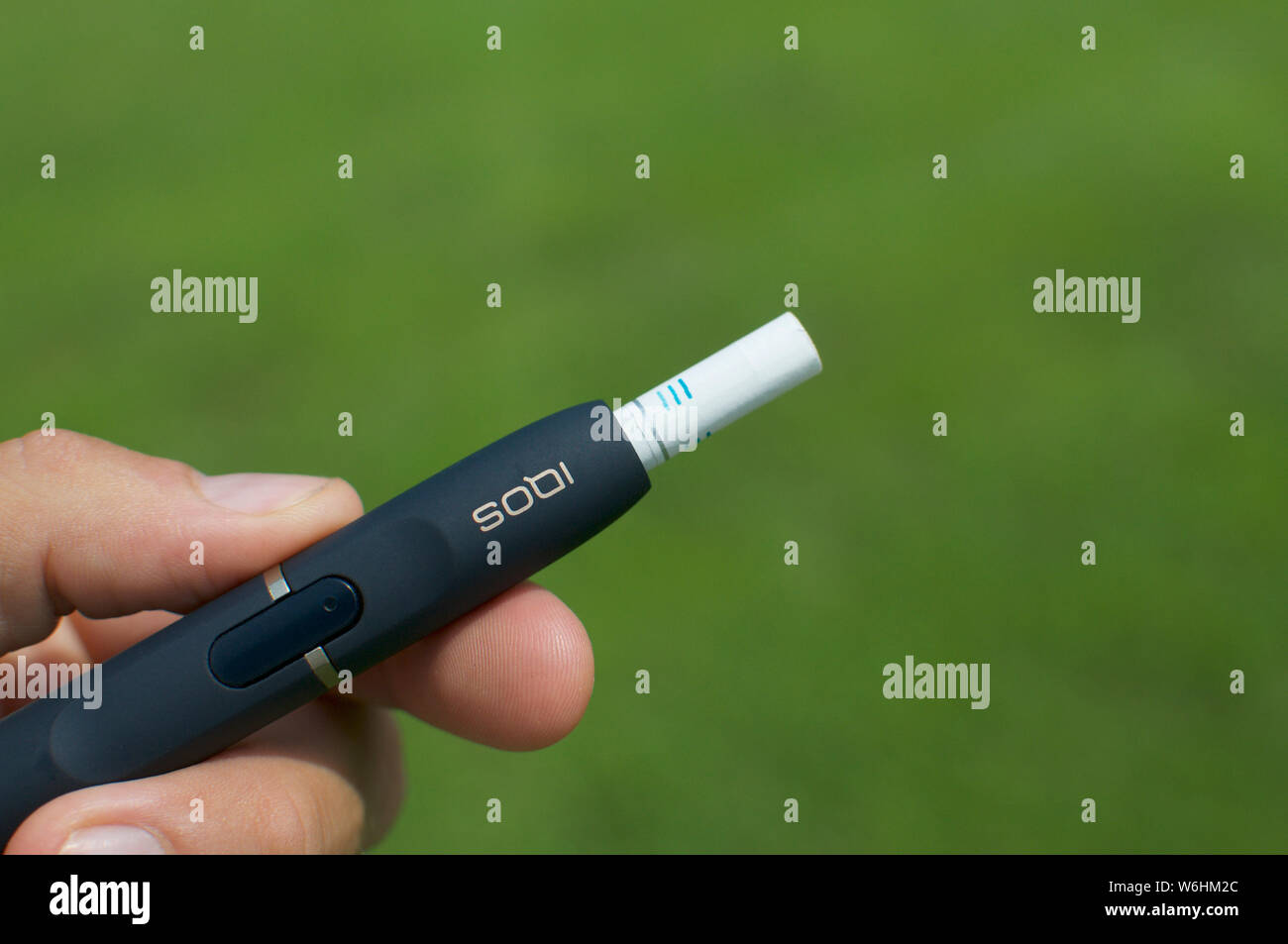 Iqos device hi-res stock photography and images - Alamy