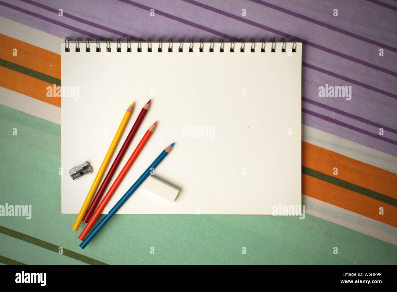 close up photograph of a clean white sketch pad and artists pencils Stock  Photo - Alamy