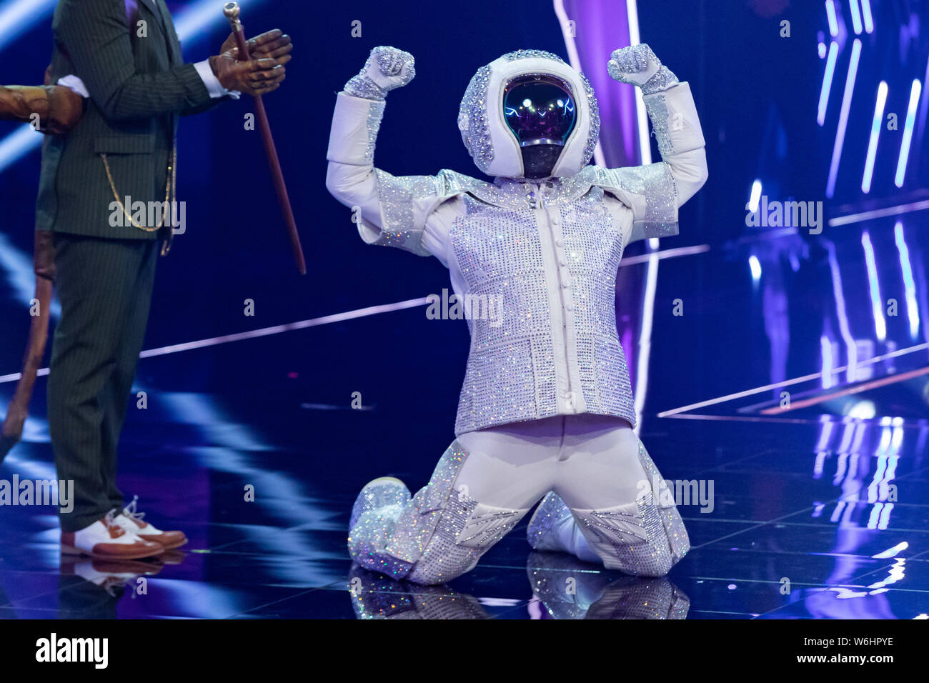 Cologne, Germany. 01st Aug, 2019. The winner of the ProSieben show "The Masked  Singer", Max Mutzke, cheers as "astronaut" on stage. Credit: Marcel  Kusch/dpa/Alamy Live News Stock Photo - Alamy