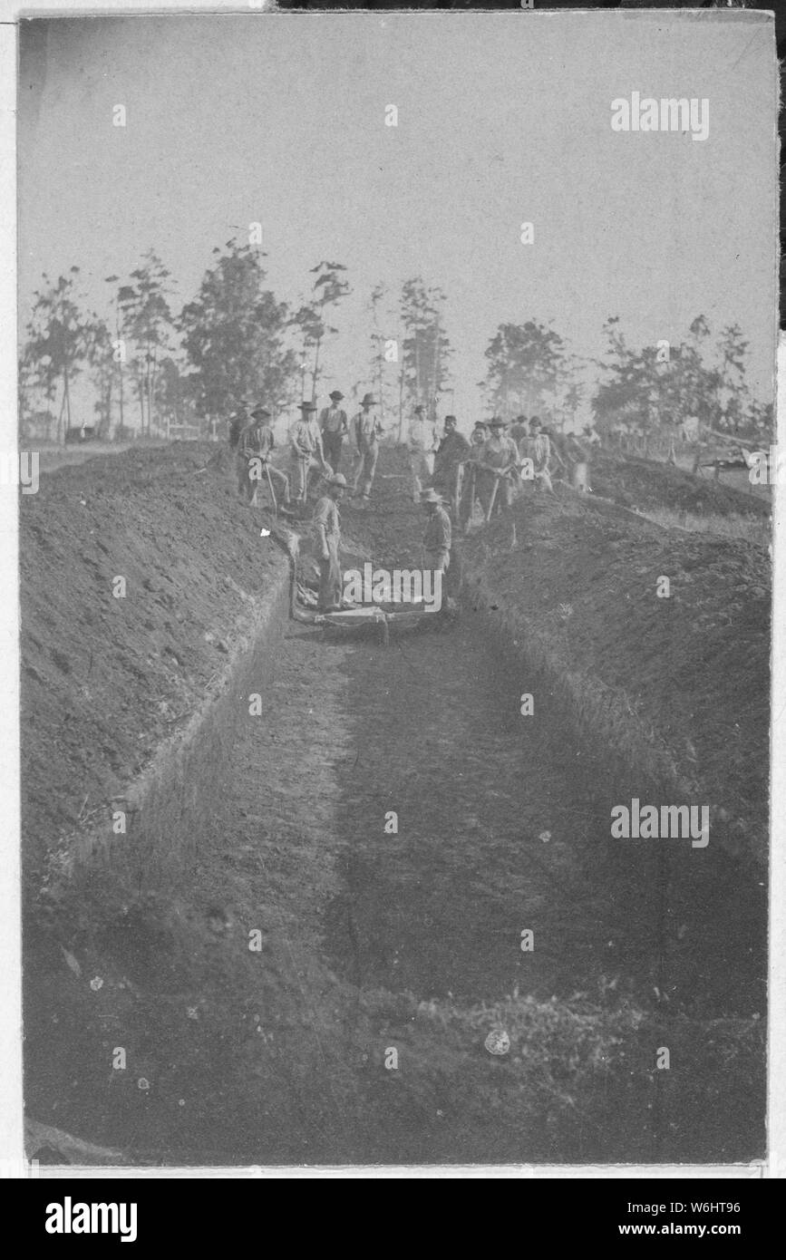 How they buried them. Andersonville Prison, Georgia, August 17, 1864., 08/17/1864; General notes:  Use War and Conflict Number 235 when ordering a reproduction or requesting information about this image. Stock Photo