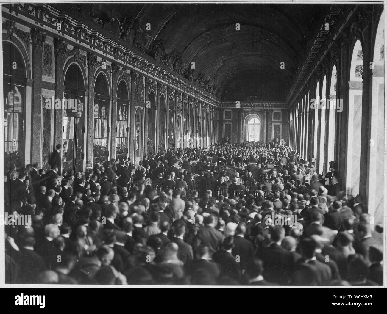Interior of the Palace des Glaces during the signing of the Peace Terms. Versailles, France., 06/28/1919; General notes:  Use War and Conflict Number 724 when ordering a reproduction or requesting information about this image. Stock Photo