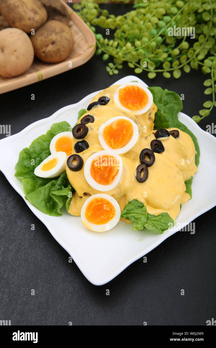 Potato with cheese sauce Stock Photo - Alamy