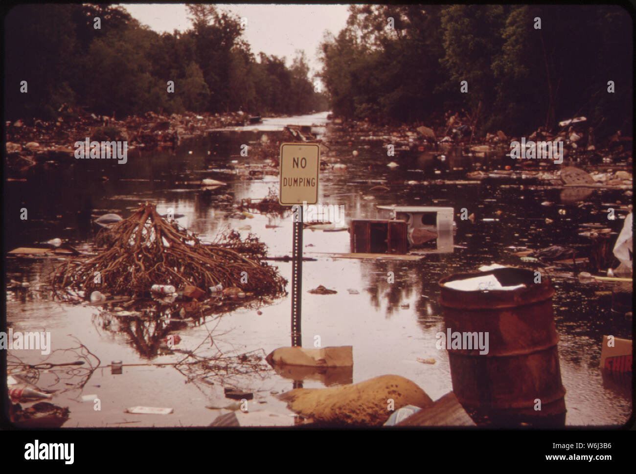 LAKE PONTCHARTRAIN SPILLS OVER ONTO ILLEGAL DUMPING GROUND THE LAKE IS OVER  FULL FROM HEAVY RAINS AND WATER DIVERTED FROM THE FLOODING MISSISSIPPI  RIVER BY THE OPENING OF THE BONNET CARRE SPILLWAY