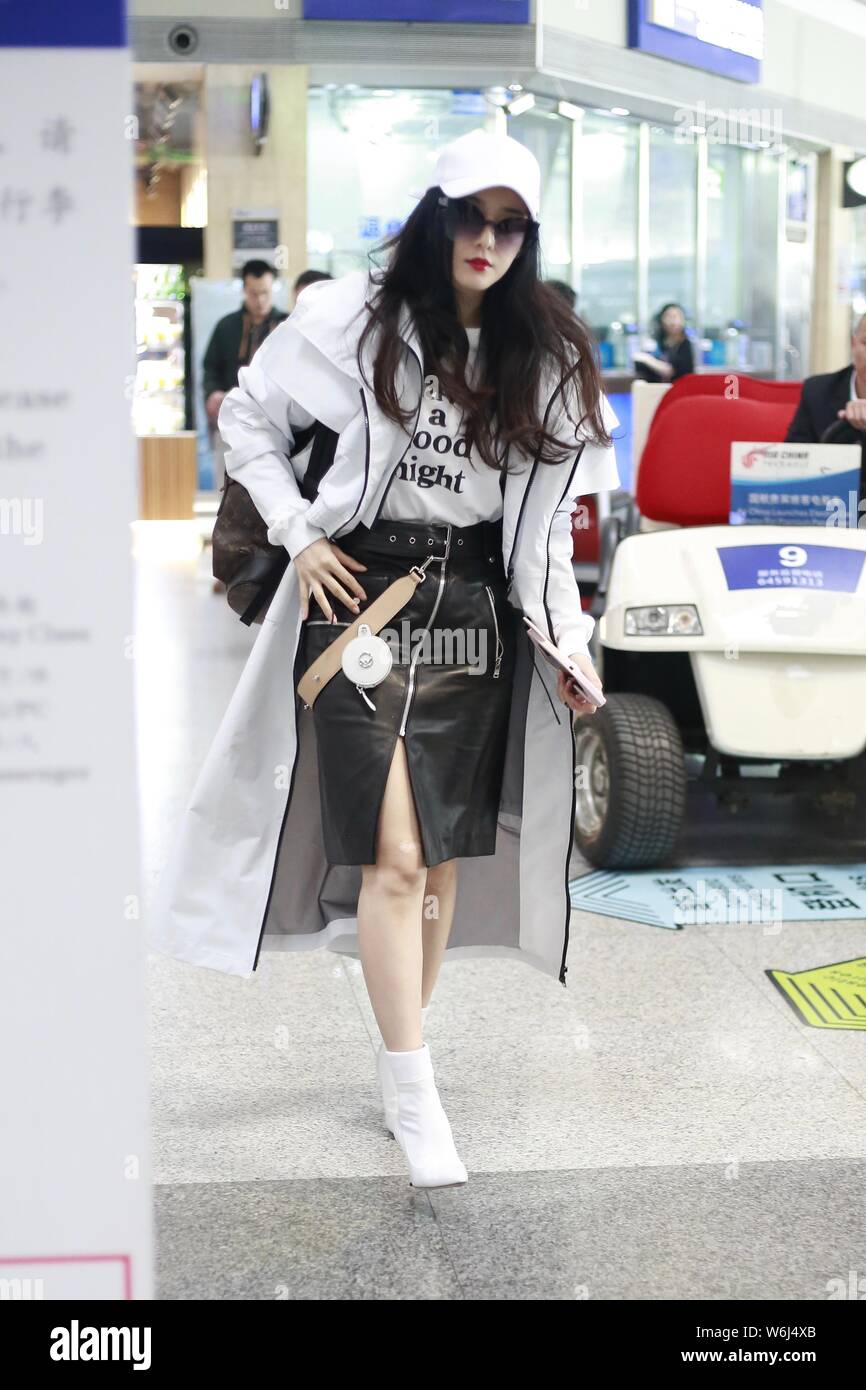 Chinese actress Fan Bingbing arrives at the Beijing Capital International Airport in Beijing, China, 27 March 2018.   Backpack: Louis Vuitton  Handbag Stock Photo