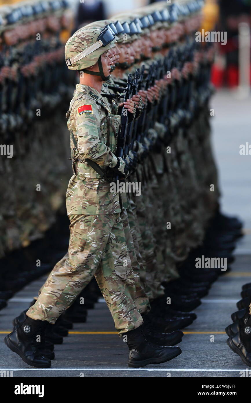 --FILE--Chinese PLA (People's Liberation Army) soldiers march past the ...